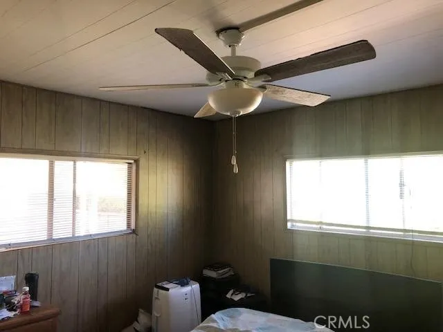 a bathroom with a toilet sink and window