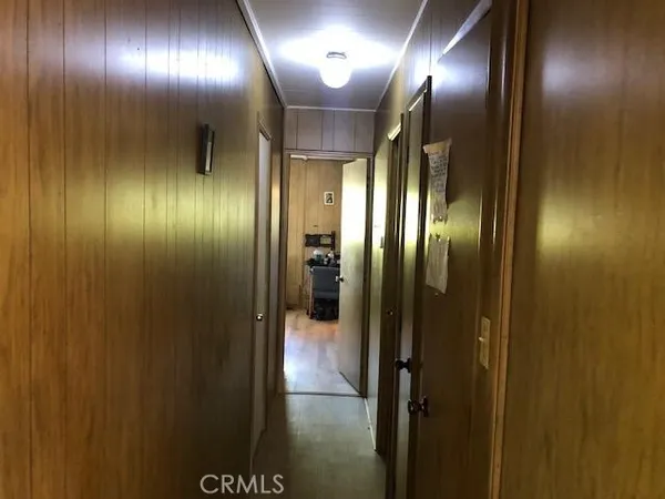a view of a hallway with mirror
