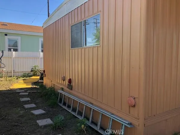 a view of balcony and yard