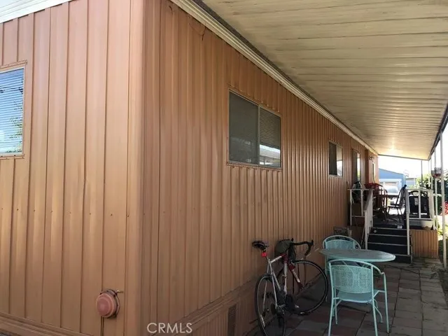 a view of a hallway with chairs