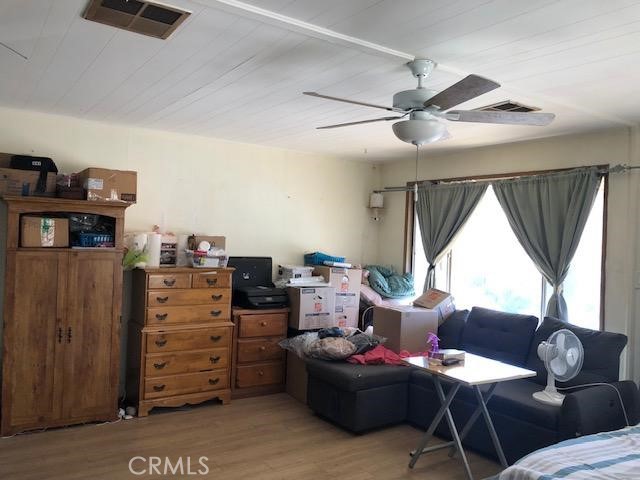 3050 West Ball Road, Unit 195 Anaheim, CA 92804 - Photo 8 of 19 a living room with furniture and a window