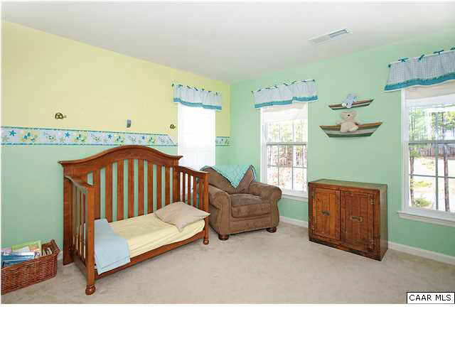 1099 Willow Ridge Road Troy, VA 22974 - Photo 13 of 39 a bedroom with furniture and a window