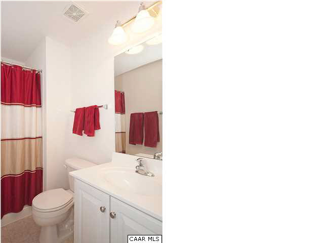 1099 Willow Ridge Road Troy, VA 22974 - Photo 17 of 39 a bathroom with a sink toilet and mirror