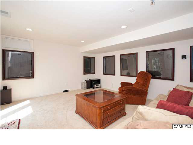 1099 Willow Ridge Road Troy, VA 22974 - Photo 18 of 39 a living room with furniture and a flat screen tv
