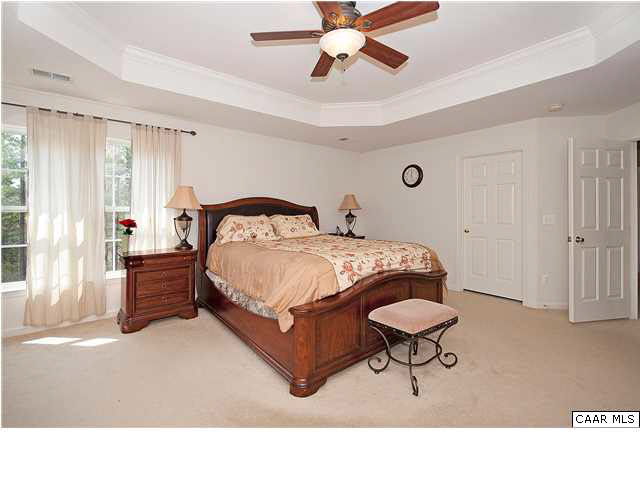 1099 Willow Ridge Road Troy, VA 22974 - Photo 24 of 39 a bedroom with a bed and window