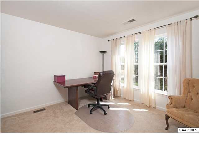 1099 Willow Ridge Road Troy, VA 22974 - Photo 25 of 39 a living room with furniture and a window