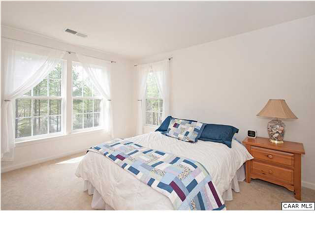 1099 Willow Ridge Road Troy, VA 22974 - Photo 27 of 39 a bedroom with a bed and a window