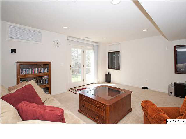 1099 Willow Ridge Road Troy, VA 22974 - Photo 29 of 39 a living room with furniture and a flat screen tv