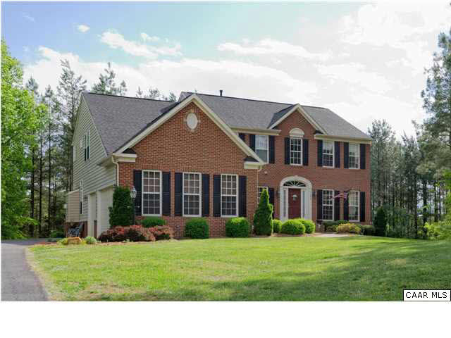 1099 Willow Ridge Road Troy, VA 22974 - Photo 32 of 39 a front view of a house with a garden