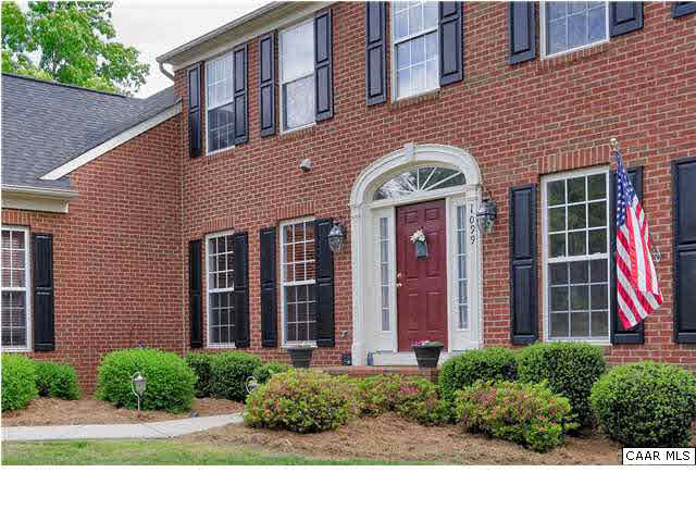 1099 Willow Ridge Road Troy, VA 22974 - Photo 33 of 39 a view of a brick building next to a yard