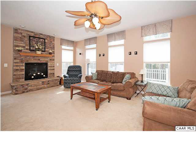 1099 Willow Ridge Road Troy, VA 22974 - Photo 9 of 39 a living room with furniture and a fireplace