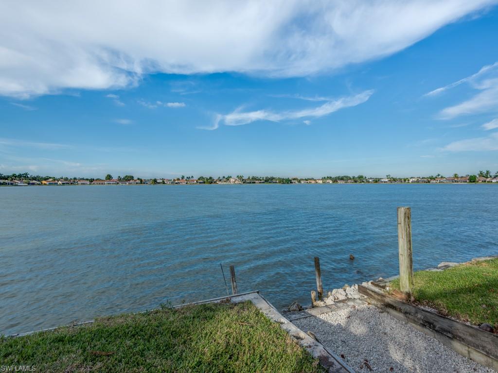 a view of a lake from a yard