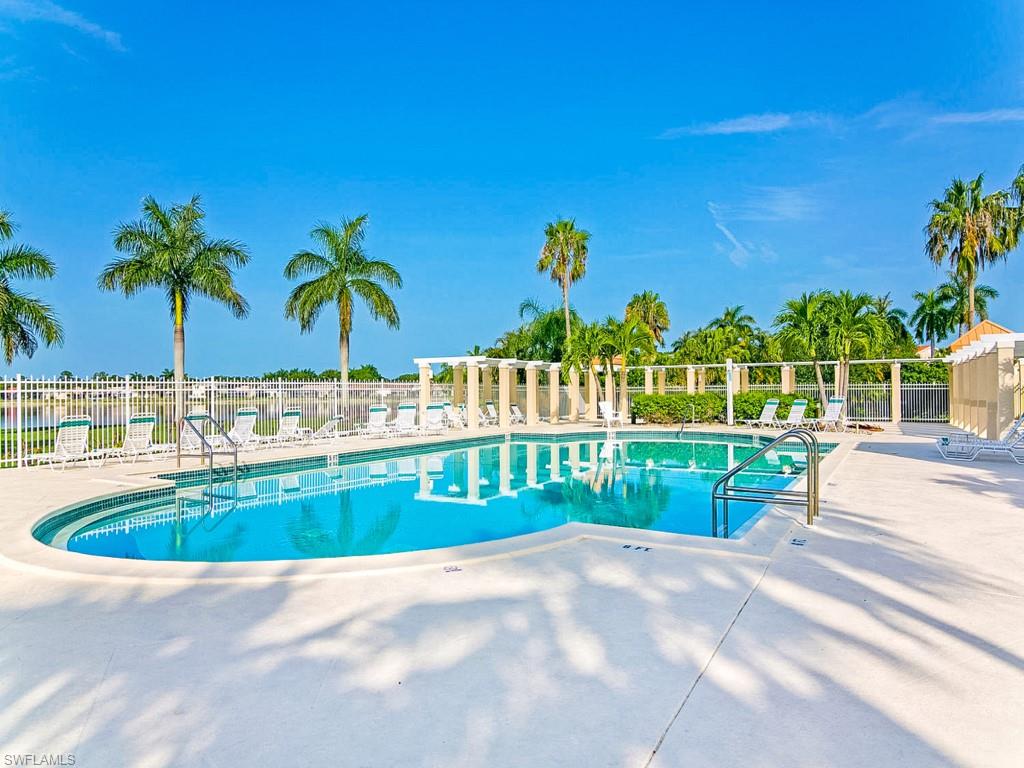 7175 Mill Pond Circle Naples, FL 34109 - Photo 14 of 14 a view of swimming pool and outdoor kitchen