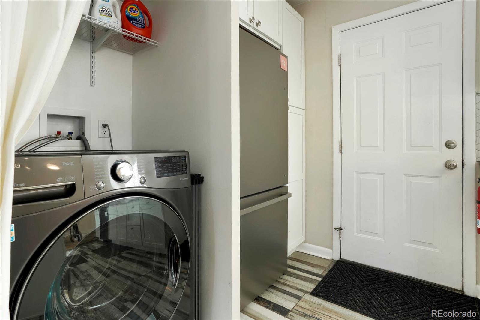 1070 South Decatur Street Denver, CO 80219 - Photo 17 of 18 a view of washer and dryer