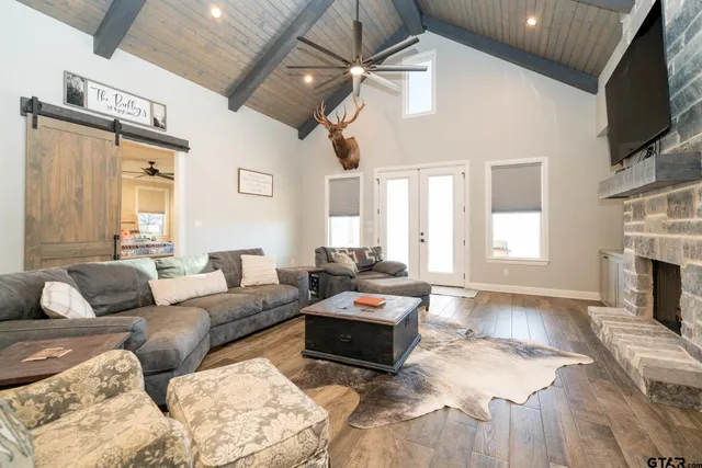 a large bathroom with a double vanity sink and a mirror