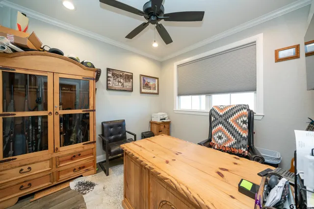 a large bathroom with a large tub sink shower and mirror