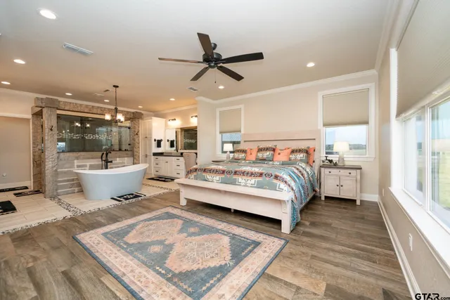 a bed room with a bed and a window