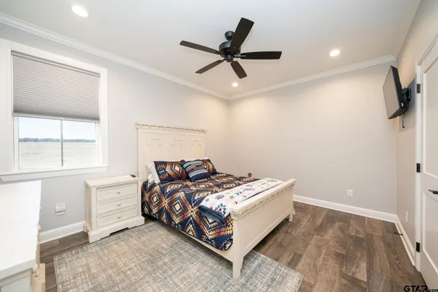 a kitchen with a stove sink and cabinets