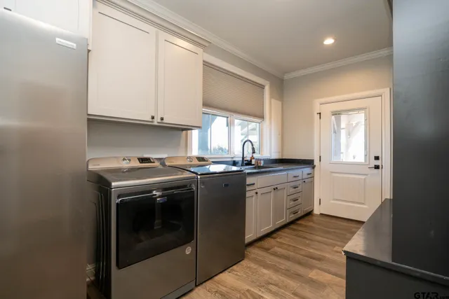 a view of a chairs and table in the patio