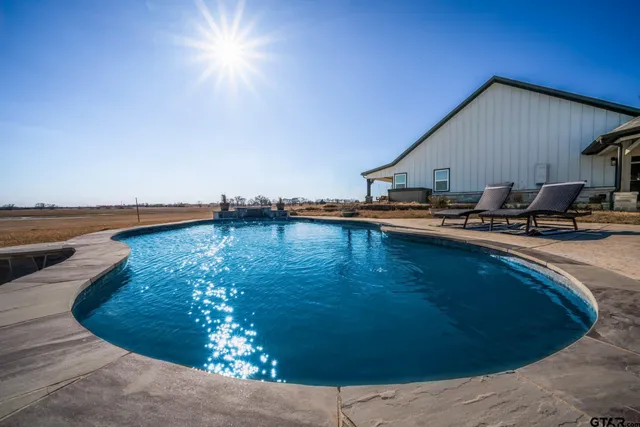 a view of parking garage with cars