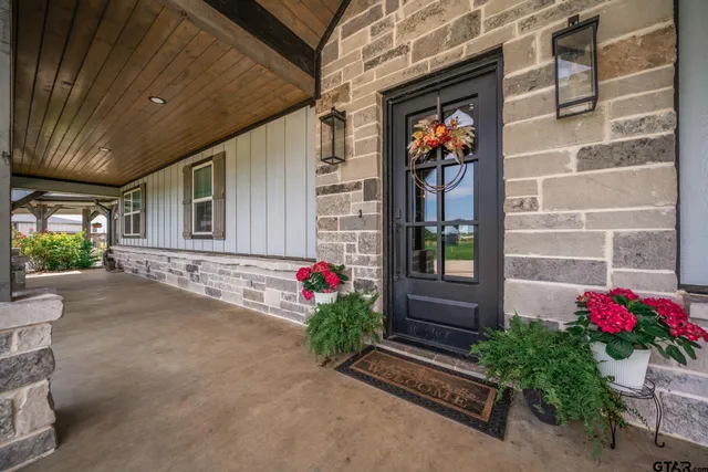 a front view of a house with an outdoor space