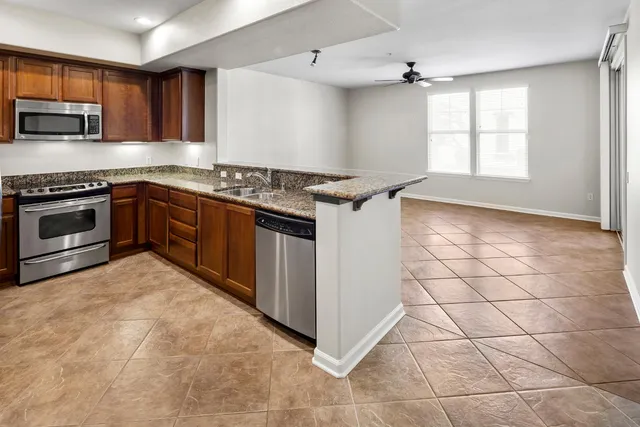 a view of a room that has a large window