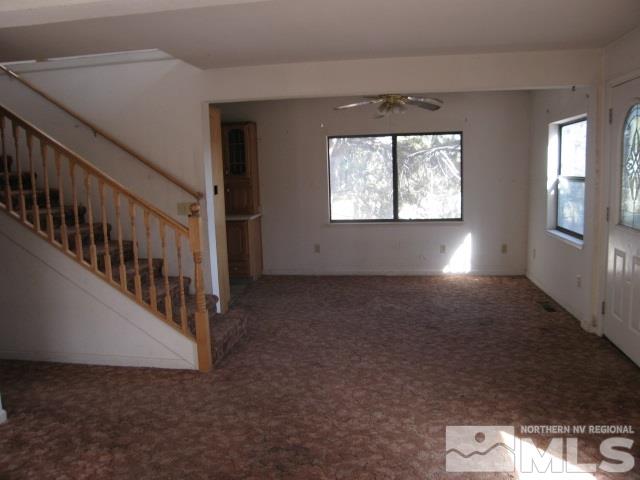 2354 Cartwright Road Reno, NV 89521 - Photo 3 of 15 wooden floor in an empty room with a window