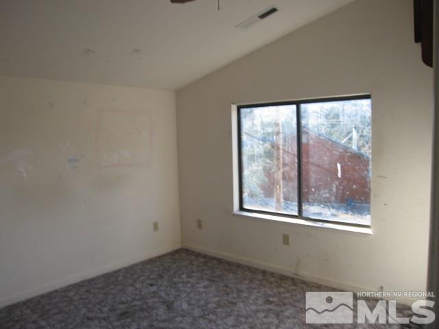 2354 Cartwright Road Reno, NV 89521 - Photo 8 of 15 a view of an empty room with a window