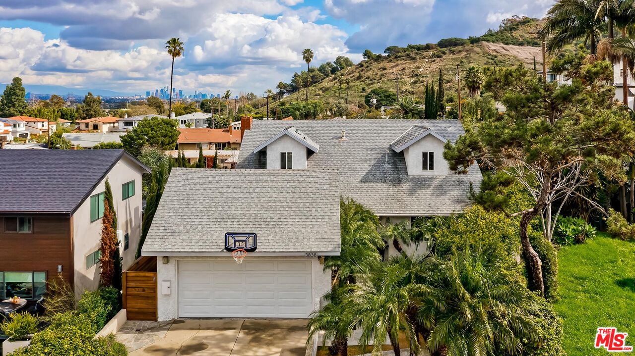 3838 Crestview Road Culver City, CA 90232 - Photo 2 of 53 an aerial view of a house with a garden