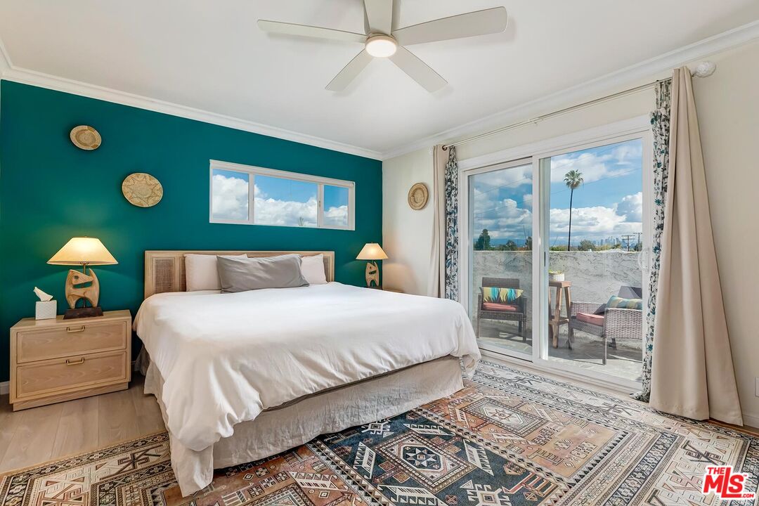 3838 Crestview Road Culver City, CA 90232 - Photo 22 of 53 a bedroom with a bed and a window