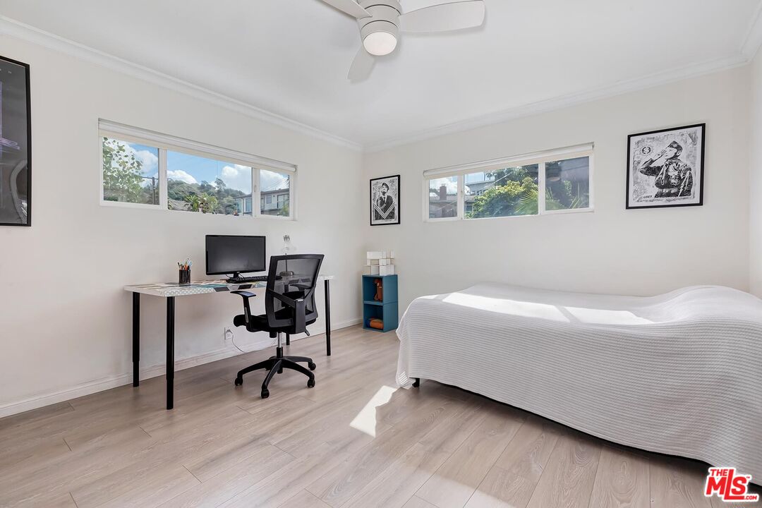 3838 Crestview Road Culver City, CA 90232 - Photo 31 of 53 a workspace with a couch