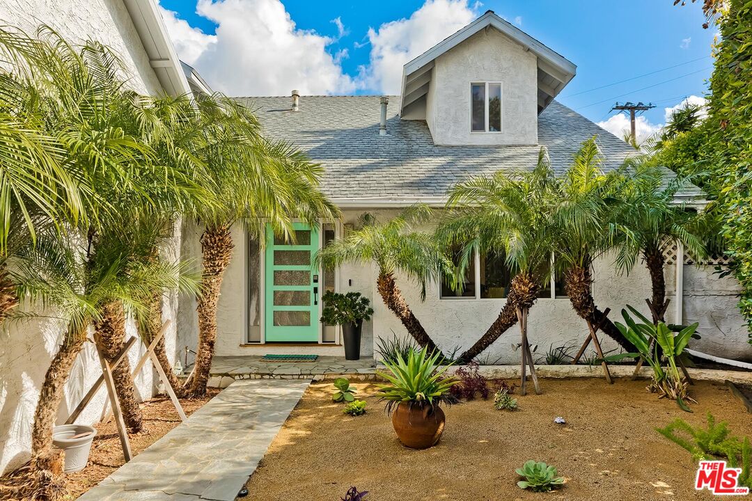 3838 Crestview Road Culver City, CA 90232 - Photo 4 of 53 a house view with a garden space