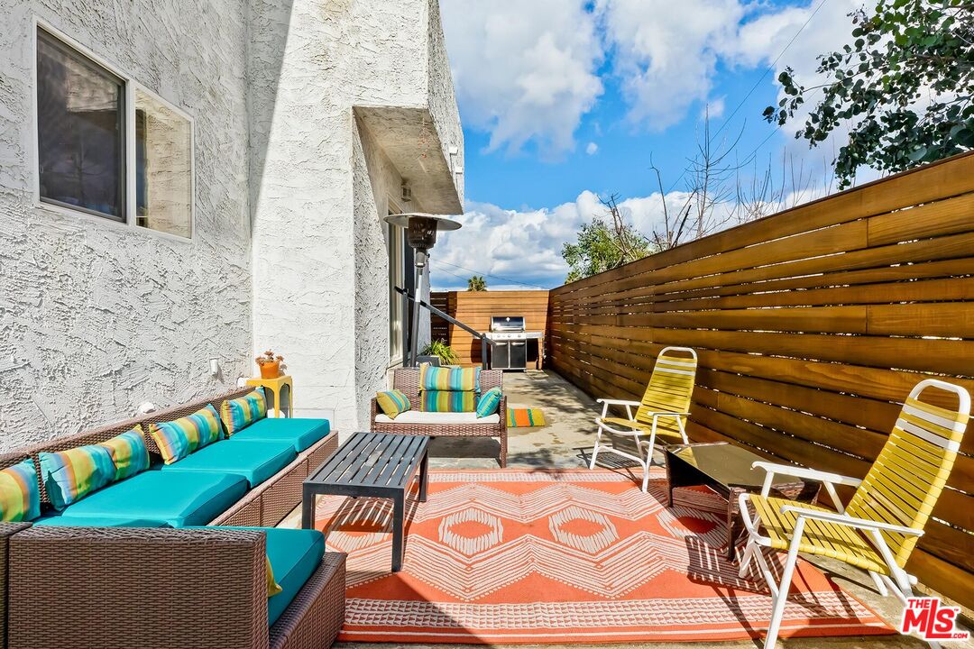 3838 Crestview Road Culver City, CA 90232 - Photo 43 of 53 a view of an outdoor sitting area with furniture