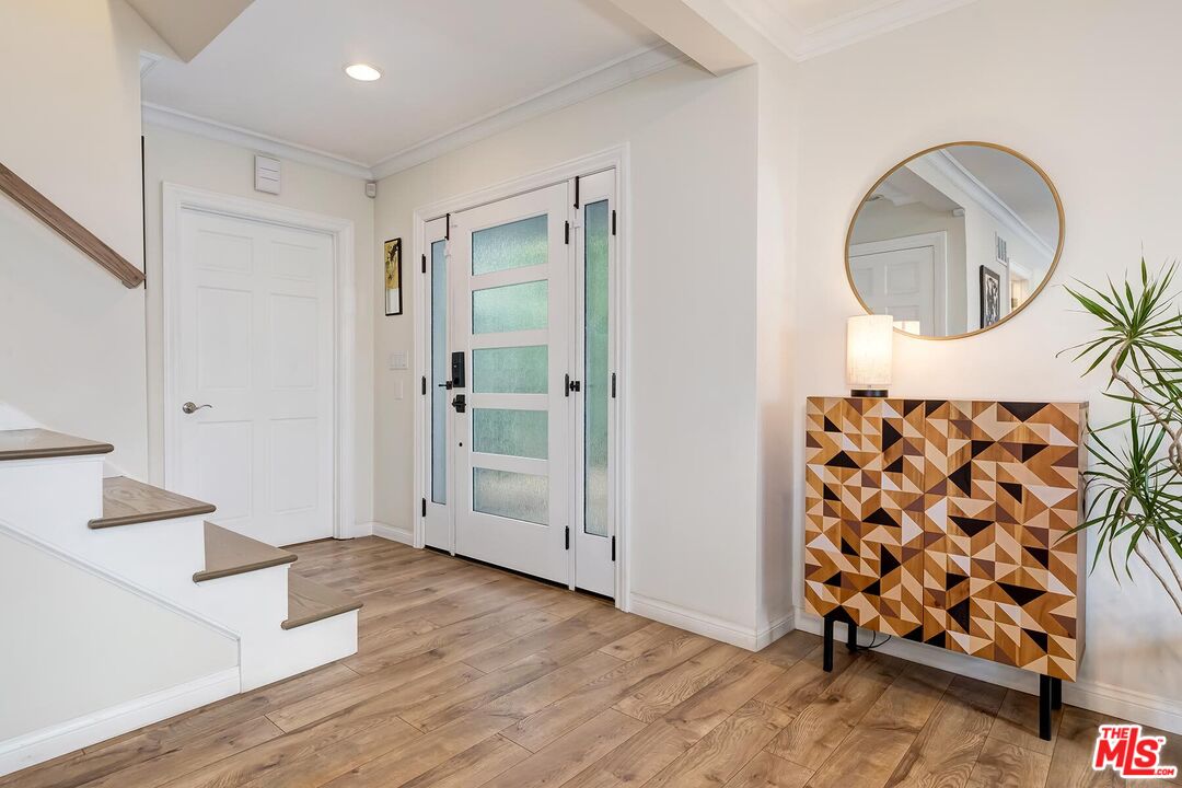 3838 Crestview Road Culver City, CA 90232 - Photo 5 of 53 wooden floor with white walls