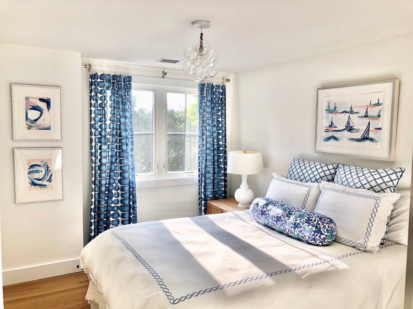 12 Hildreth Place Hampton Bays, NY 11946 - Photo 5 of 7 a bedroom with a large bed and a window