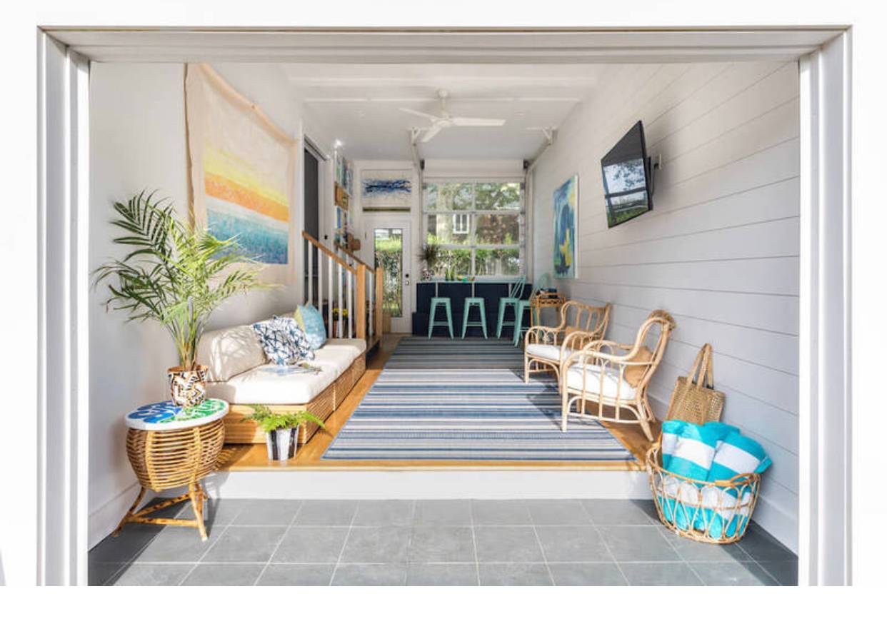 12 Hildreth Place Hampton Bays, NY 11946 - Photo 7 of 7 a living room filled with furniture and a table