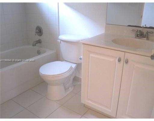 970 Abaco Lane Riviera Beach, FL 33404 - Photo 25 of 50 a bathroom with a sink toilet and shower