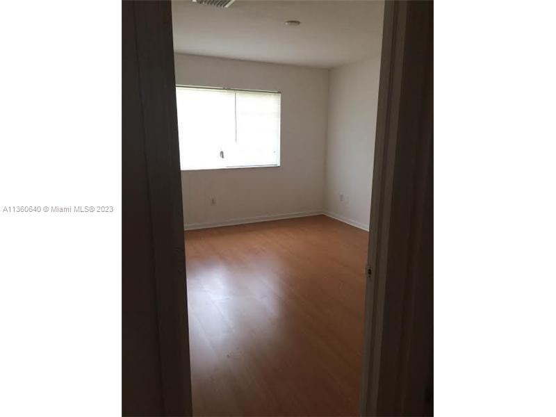 970 Abaco Lane Riviera Beach, FL 33404 - Photo 27 of 50 a view of an empty room with a window