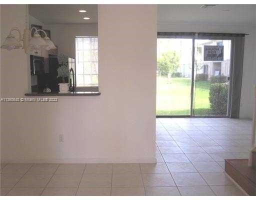 970 Abaco Lane Riviera Beach, FL 33404 - Photo 3 of 50 a view of an empty room with a window