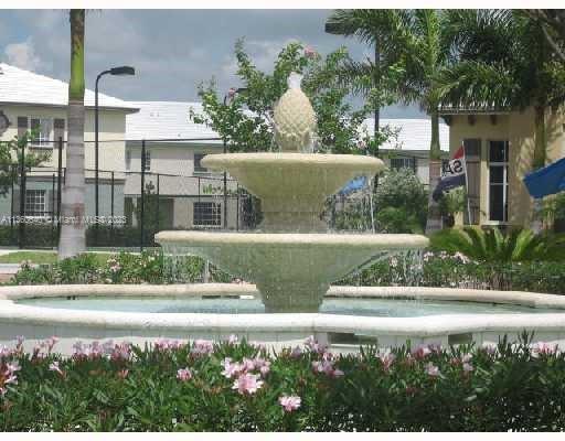 970 Abaco Lane Riviera Beach, FL 33404 - Photo 31 of 50 a view of fountain in front of a house