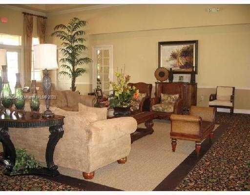 970 Abaco Lane Riviera Beach, FL 33404 - Photo 32 of 50 a living room with furniture and a large window