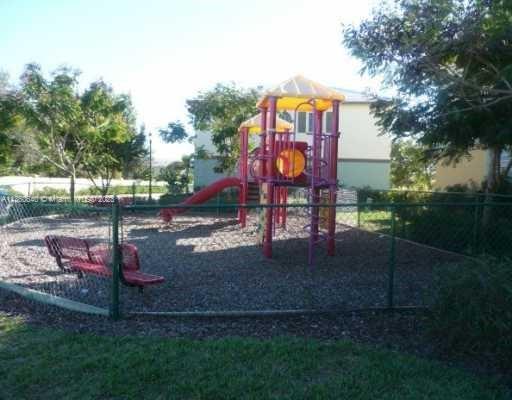 970 Abaco Lane Riviera Beach, FL 33404 - Photo 44 of 50 a view of a park with slide