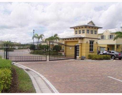 970 Abaco Lane Riviera Beach, FL 33404 - Photo 45 of 50 a view of a house with a garden