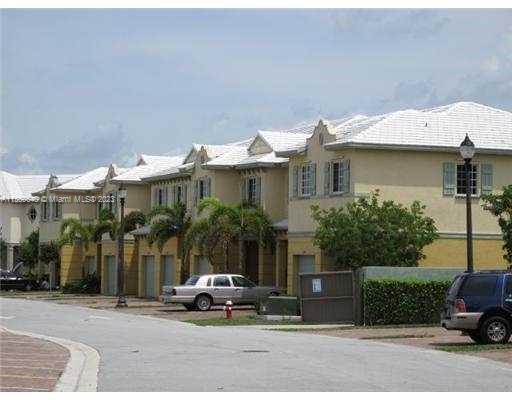 970 Abaco Lane Riviera Beach, FL 33404 - Photo 50 of 50 a parked cars parked in front of a house