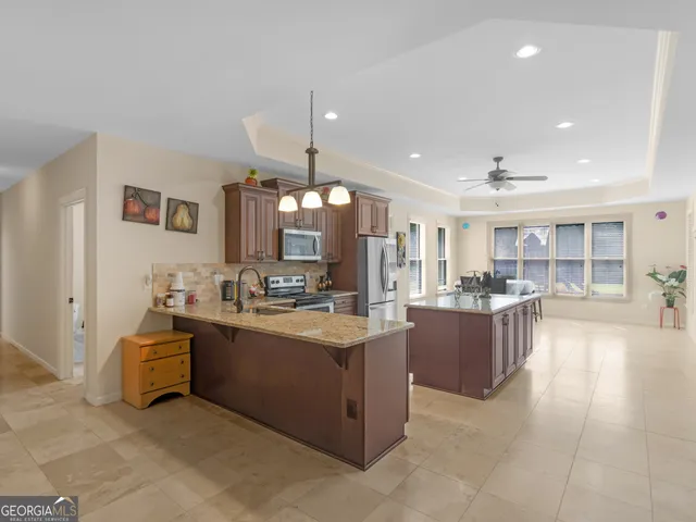 a bathroom with a window and a mirror