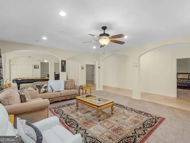 a bathroom with a sink a mirror and vanity