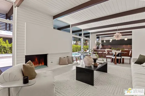 a view of a terrace with sitting area