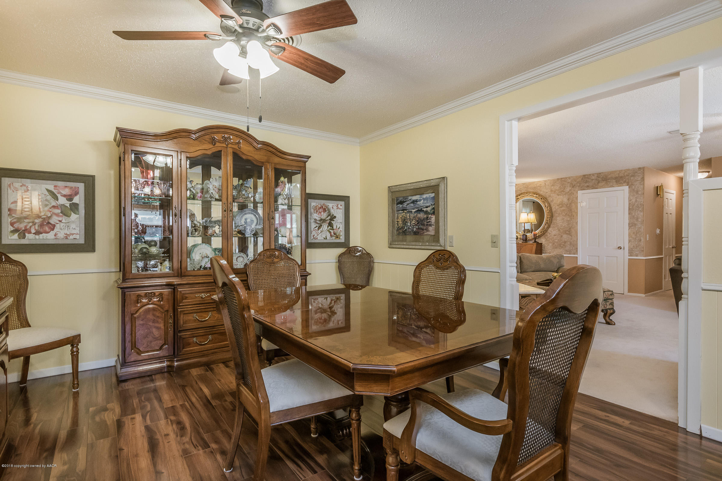 6709 Jameson Road Amarillo, TX 79106 - Photo 5 of 23 a dining room with furniture and window