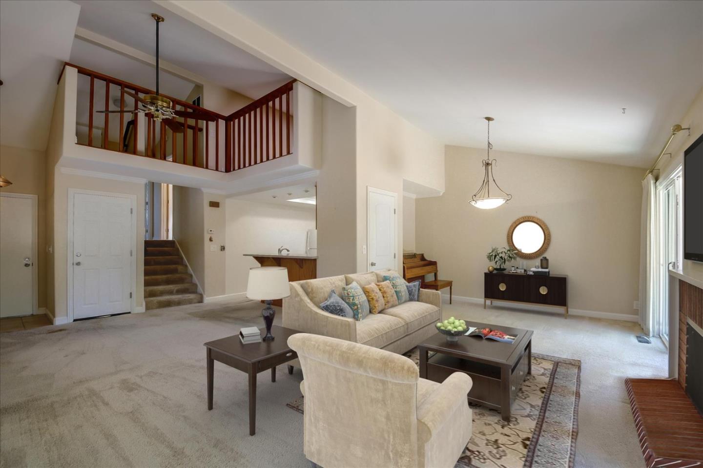 10854 Northview Square Cupertino, CA 95014 - Photo 3 of 18 a living room with furniture a window and gym equipment