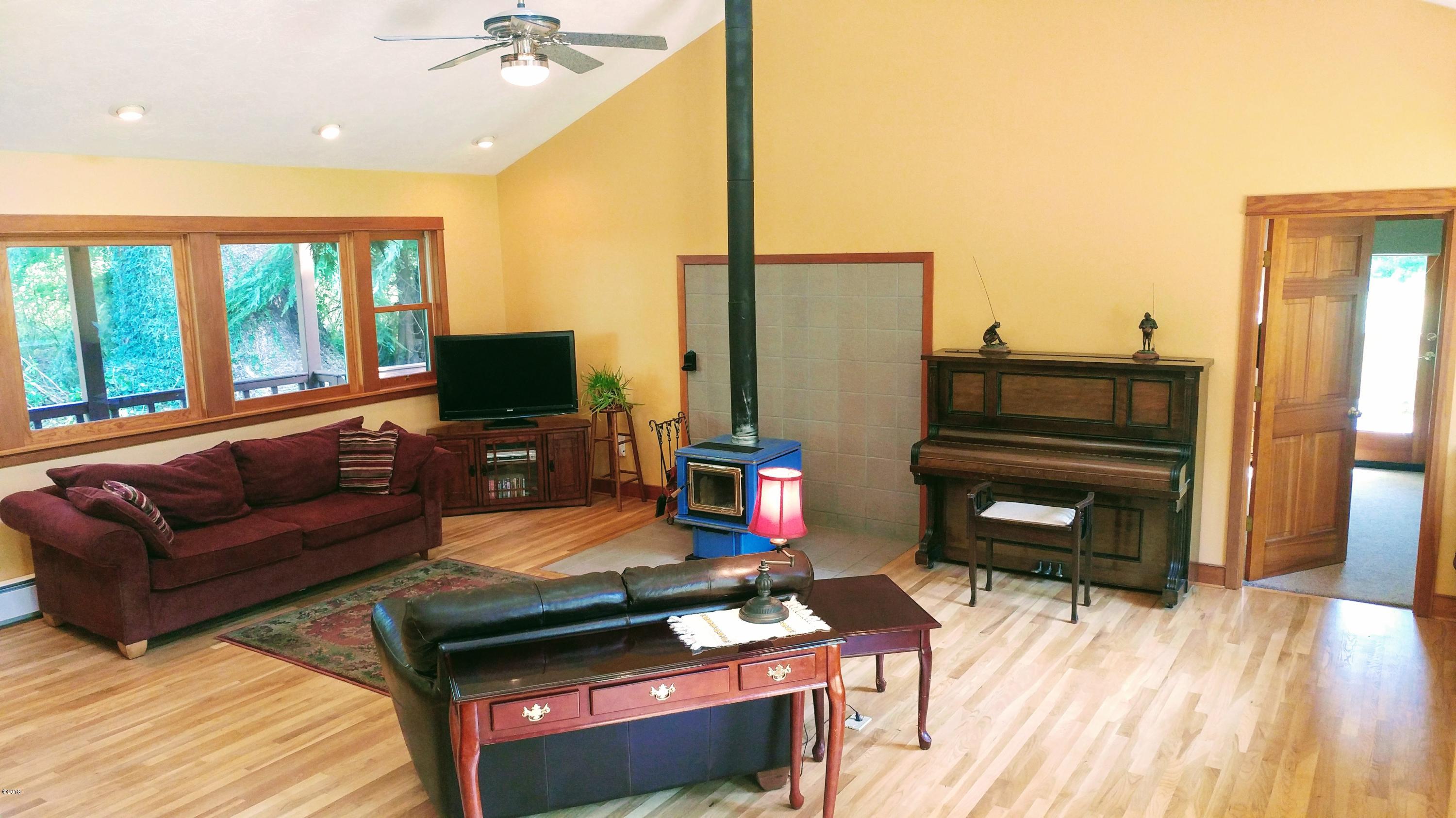 1754 Old River Road Northeast Siletz, OR 97380 - Photo 12 of 42 Living room